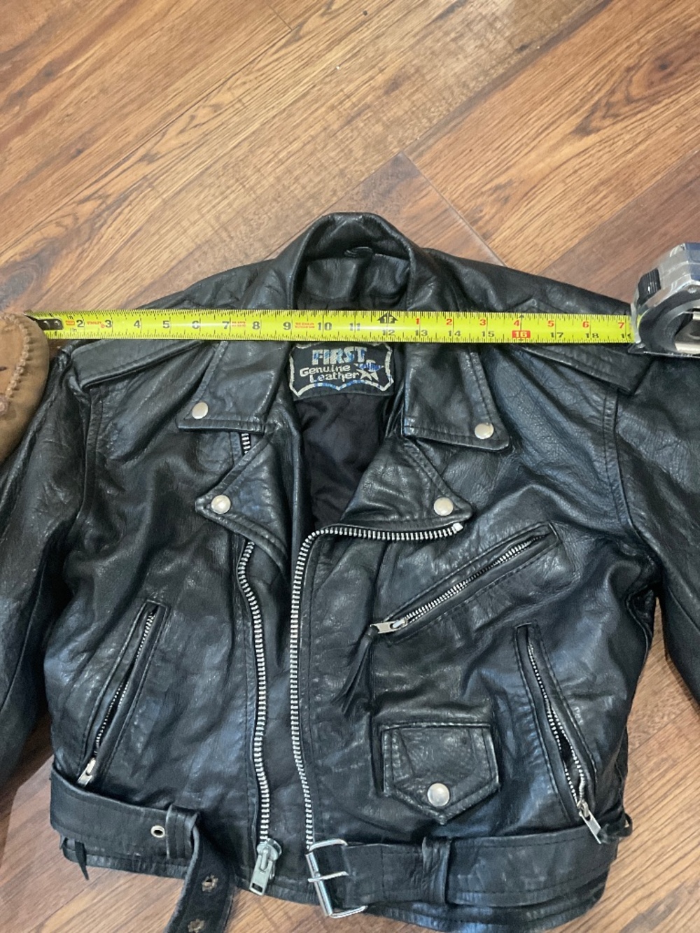 Vintage black leather motorcycle jacket
